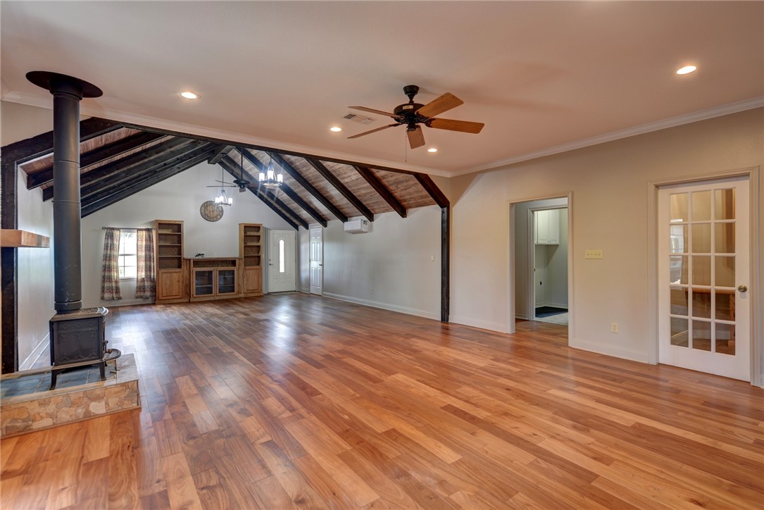 2375 FM 2935 Road North Brenham, TX 77833 - Photo 22 of 47 a view of empty room with wooden floor and fan