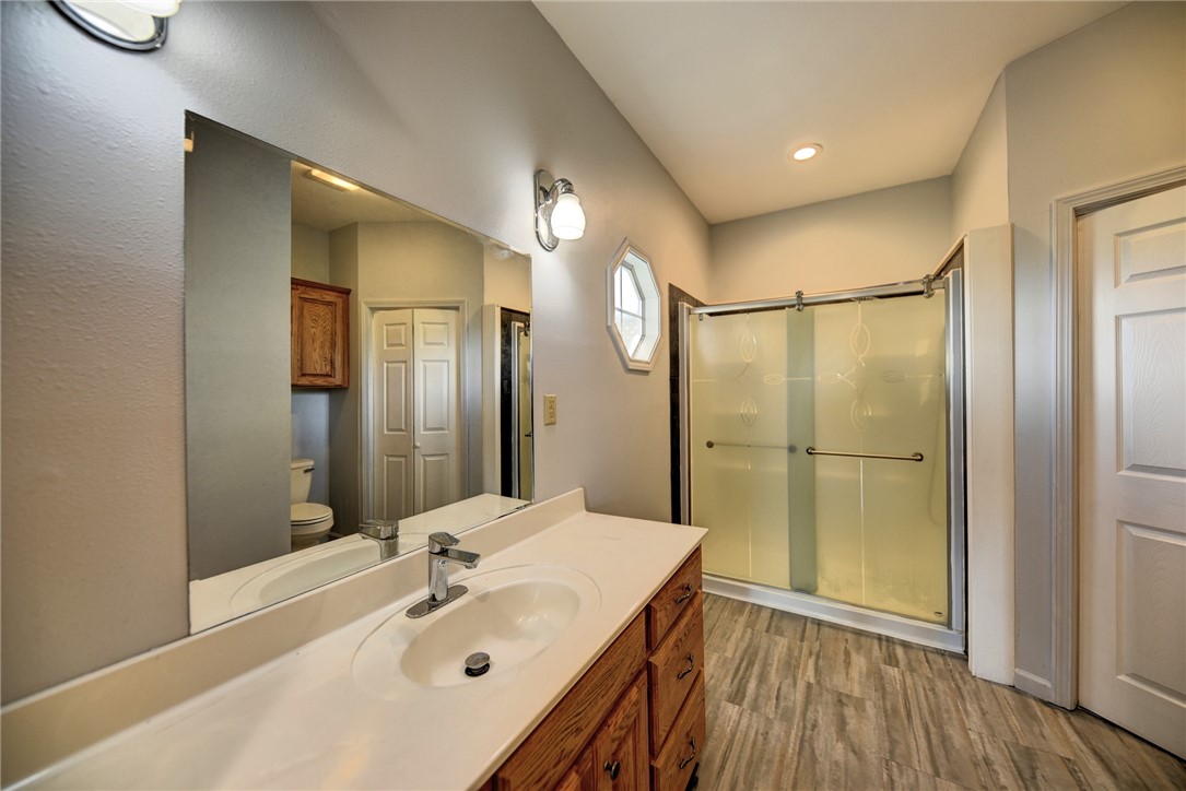 2375 FM 2935 Road North Brenham, TX 77833 - Photo 28 of 47 a bathroom with a sink and a mirror