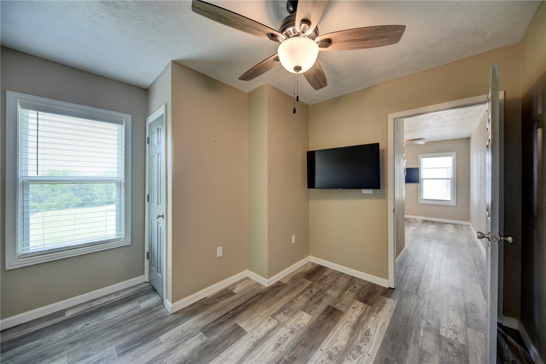 2375 FM 2935 Road North Brenham, TX 77833 - Photo 36 of 47 a view of a livingroom with a flat screen tv