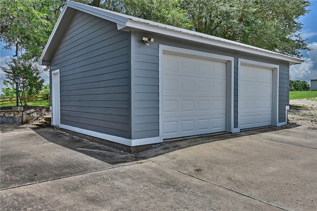 2375 FM 2935 Road North Brenham, TX 77833 - Photo 40 of 47 a view of small house with a garage