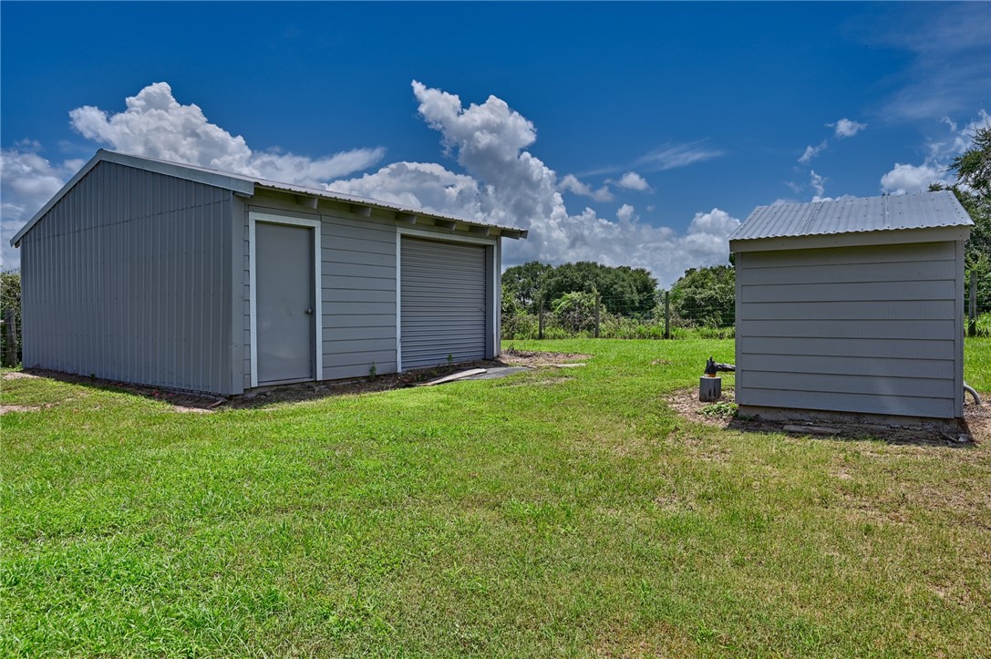 2375 FM 2935 Road North Brenham, TX 77833 - Photo 42 of 47 a view of a backyard with potted plants