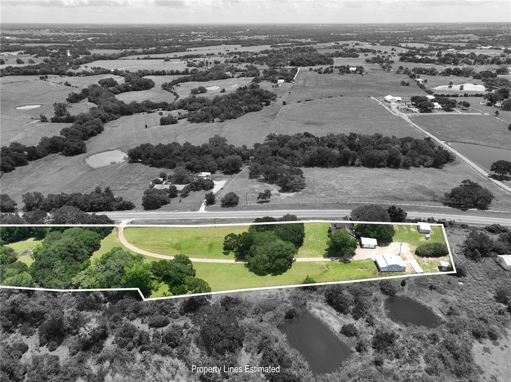 2375 FM 2935 Road North Brenham, TX 77833 - Photo 10 of 47 an aerial view of a house with a yard