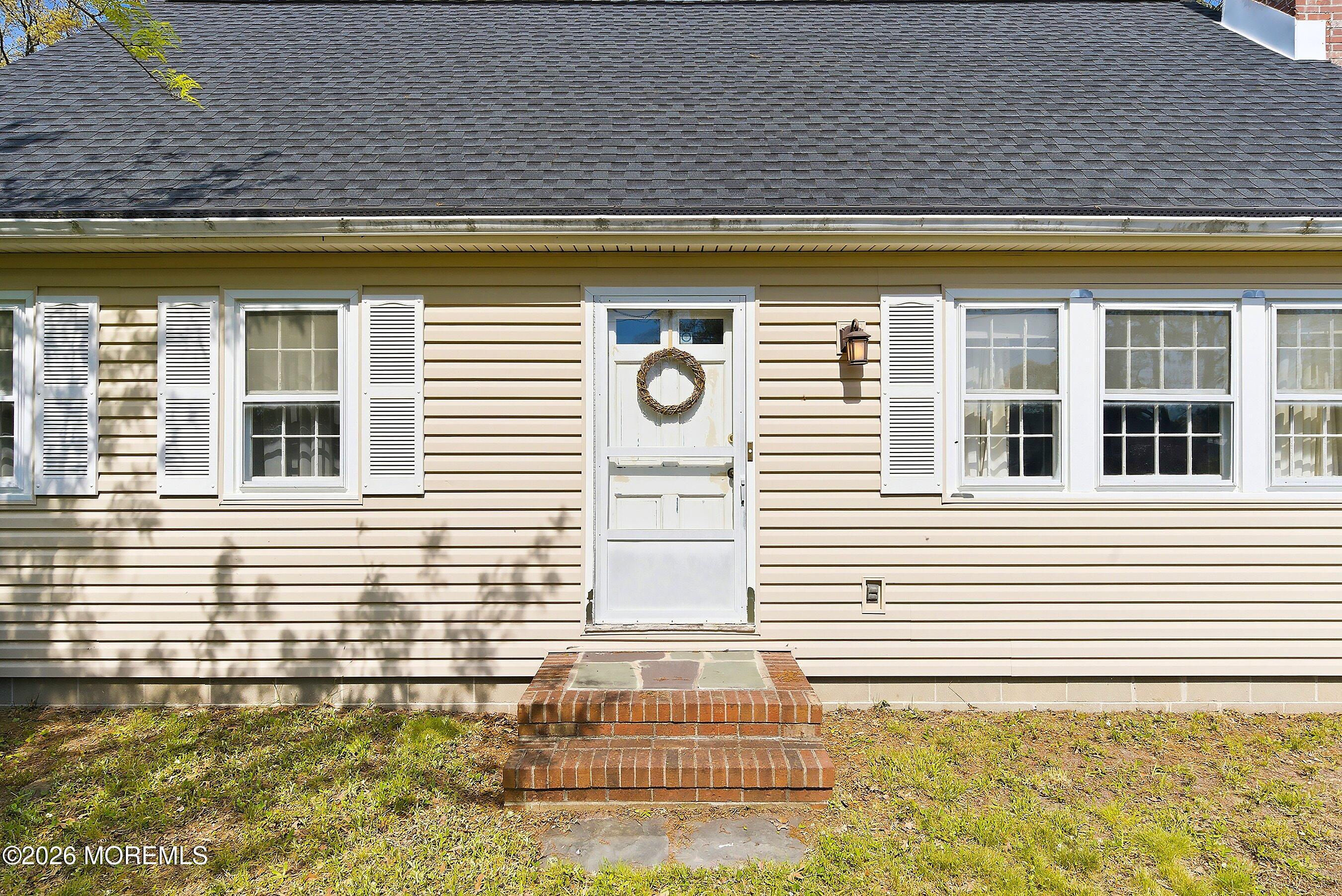 464 Newport Road Forked River, NJ 08731 - Photo 4 of 23 a front view of a house with a yard