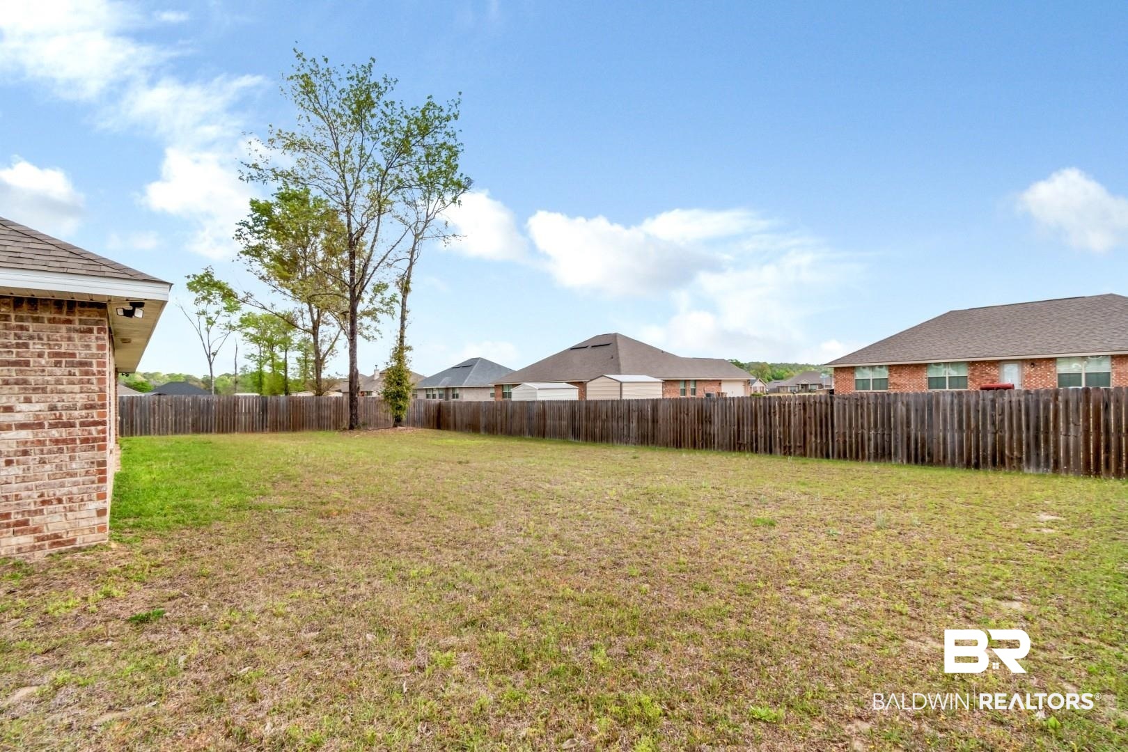 6632 Monarch Circle Mobile, AL 36618 - Photo 29 of 32 Fenced backyard featuring a residential view