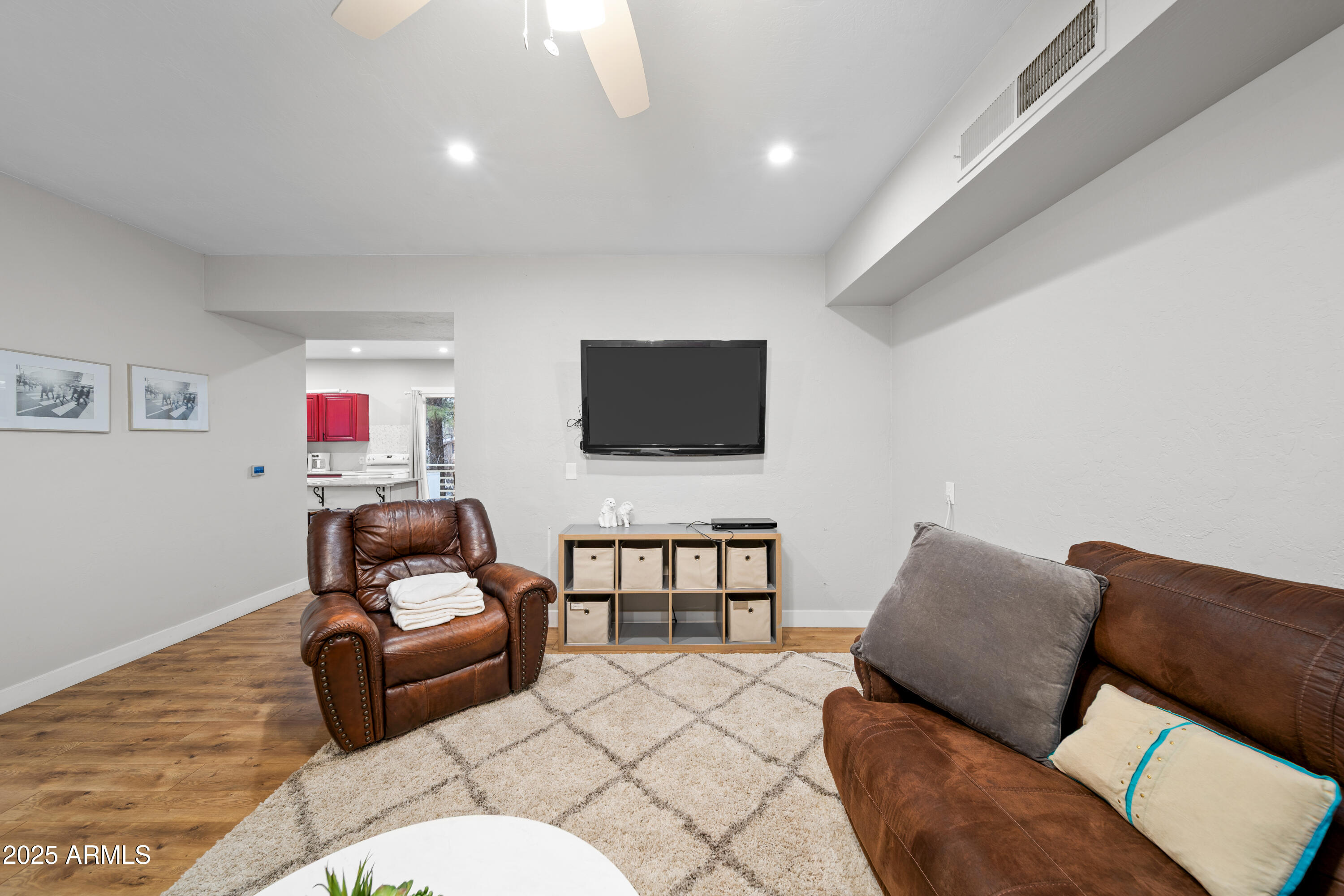 1898 Highway 260 Overgaard, AZ 85933 - Photo 12 of 38 a living room with furniture and a flat screen tv