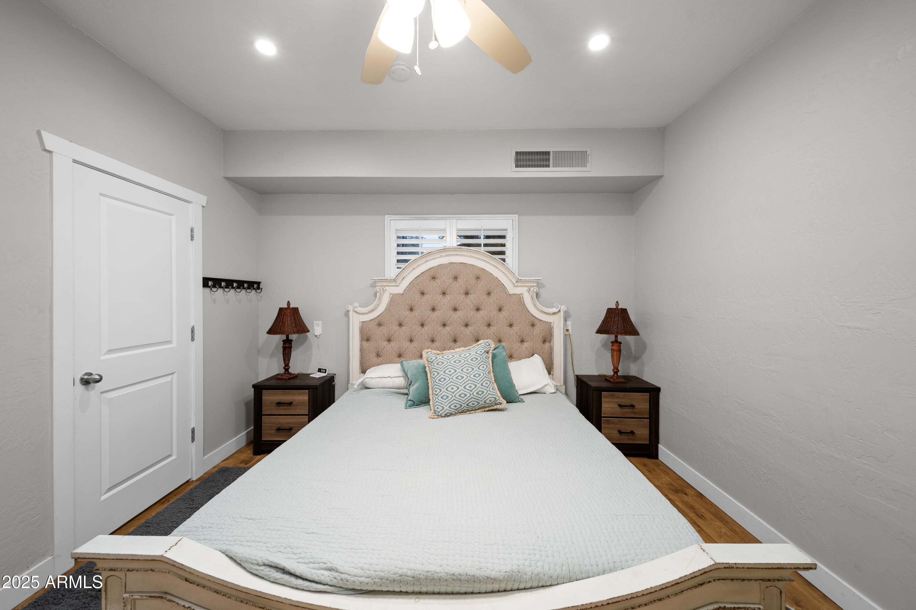 1898 Highway 260 Overgaard, AZ 85933 - Photo 13 of 38 a bedroom with a bed and a mirror