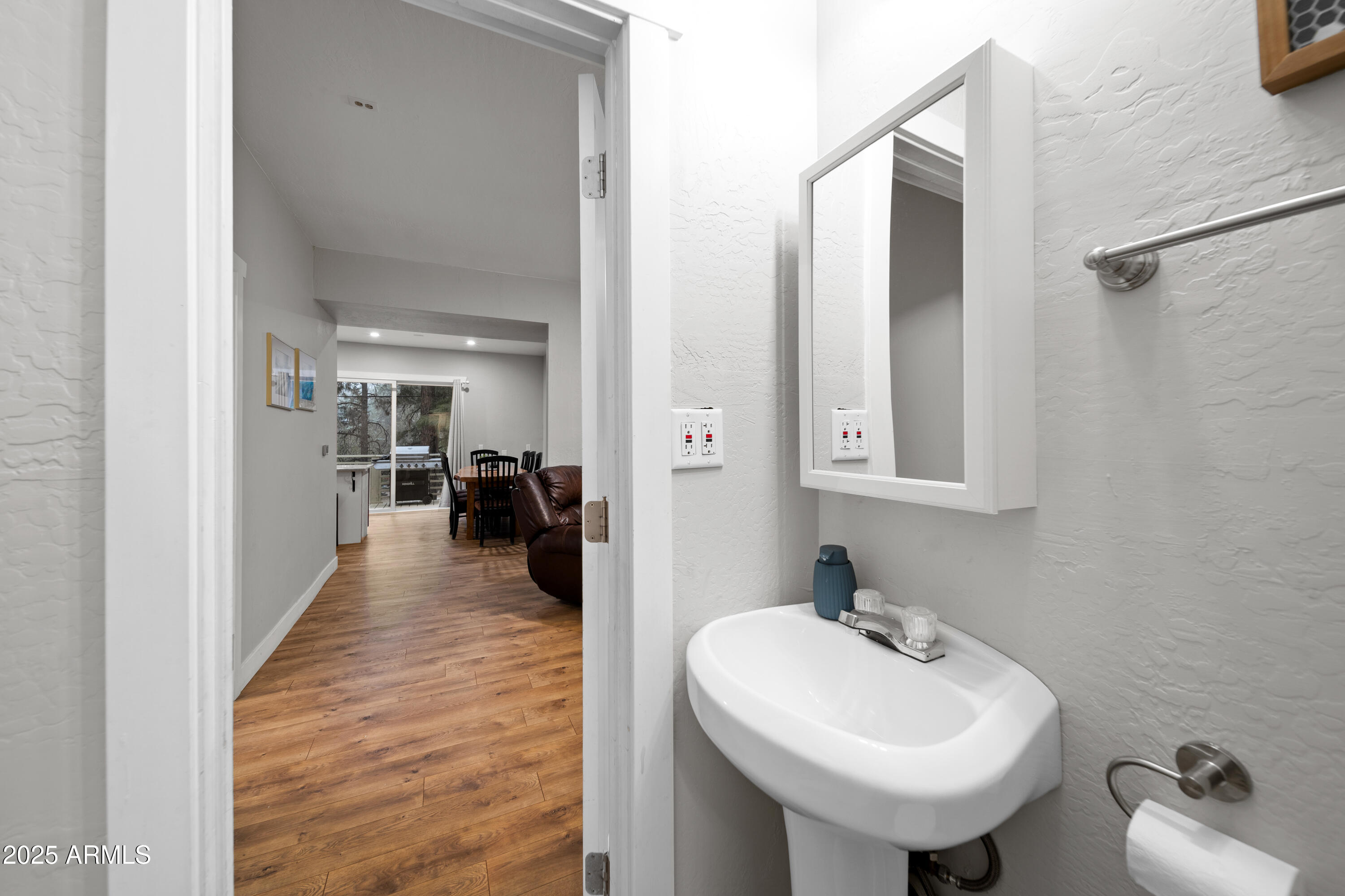 1898 Highway 260 Overgaard, AZ 85933 - Photo 17 of 38 a en suite bathroom with a sink and mirror