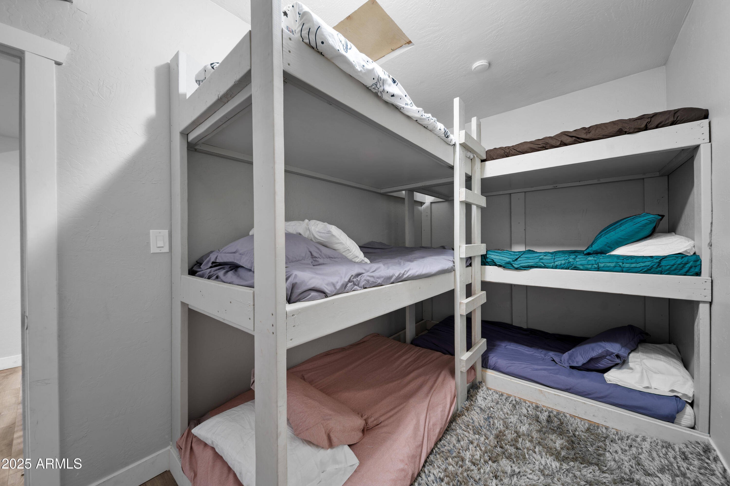 1898 Highway 260 Overgaard, AZ 85933 - Photo 19 of 38 Bunk Room