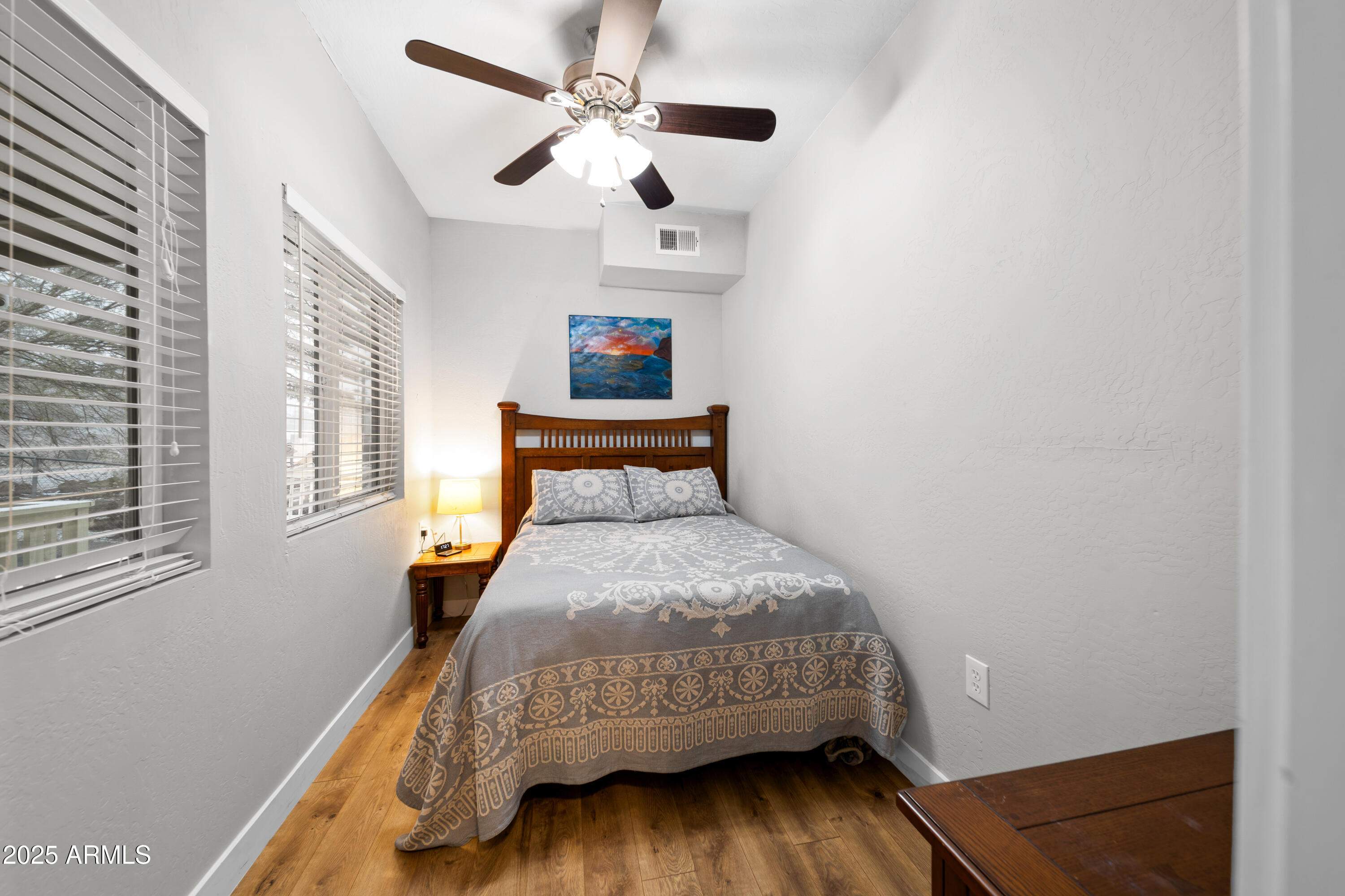 1898 Highway 260 Overgaard, AZ 85933 - Photo 20 of 38 a bedroom with a bed and a window