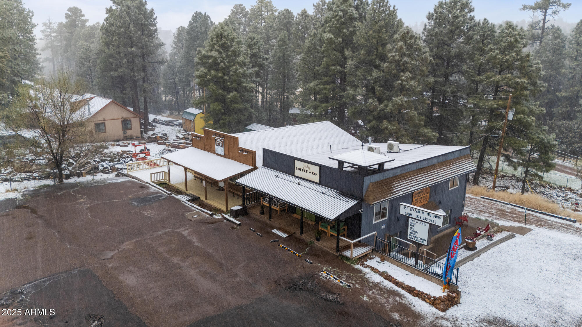 1898 Highway 260 Overgaard, AZ 85933 - Photo 36 of 38 a roof deck with table and chairs a barbeque with a forest