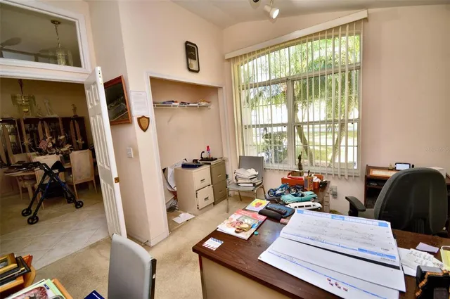 a living room with furniture and a window