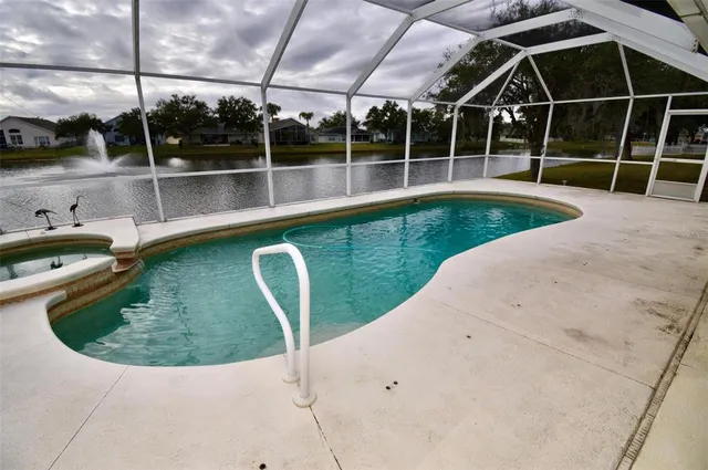a view of a swimming pool with a porch