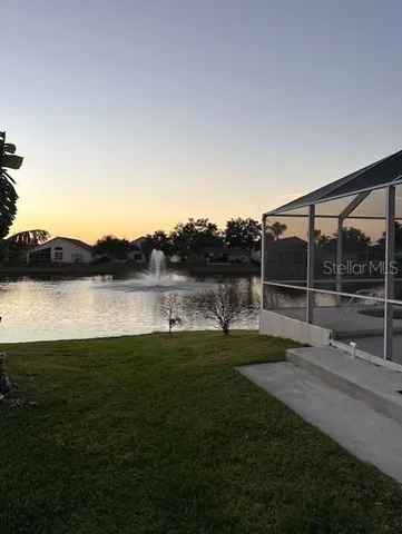 a view of a garden with lake view