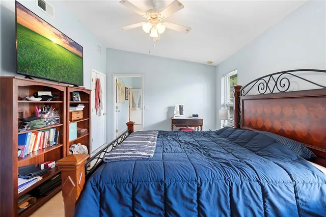 a bathroom with a sink toilet a mirror and shower
