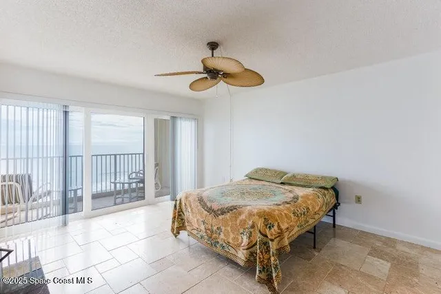 a bathroom with a double vanity sink mirror and toilet