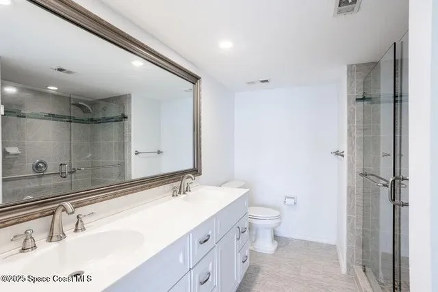 a bathroom with a tub sink and a mirror