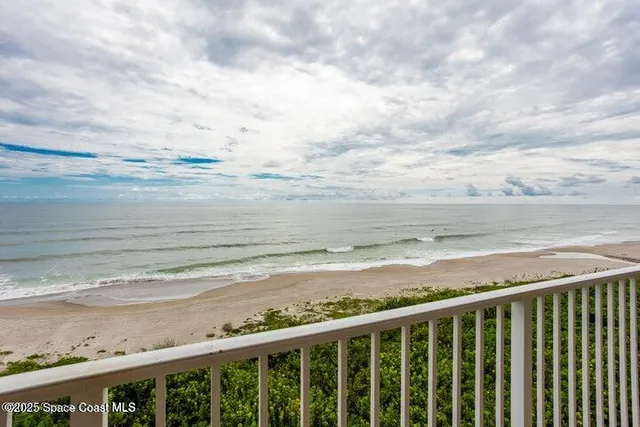a balcony with an outdoor space
