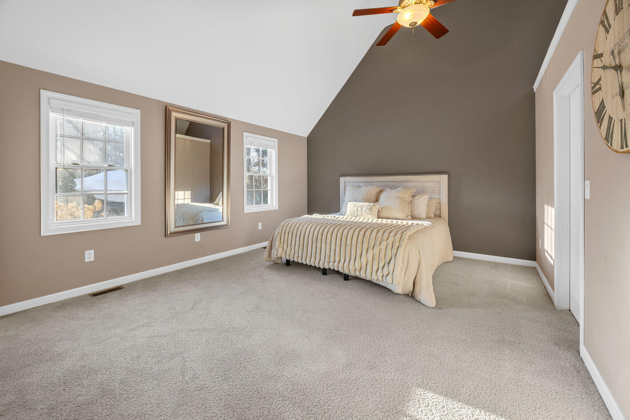 30 Flicker Lane Marstons Mills, MA 02648 - Photo 23 of 47 a bedroom with a bed and a large window