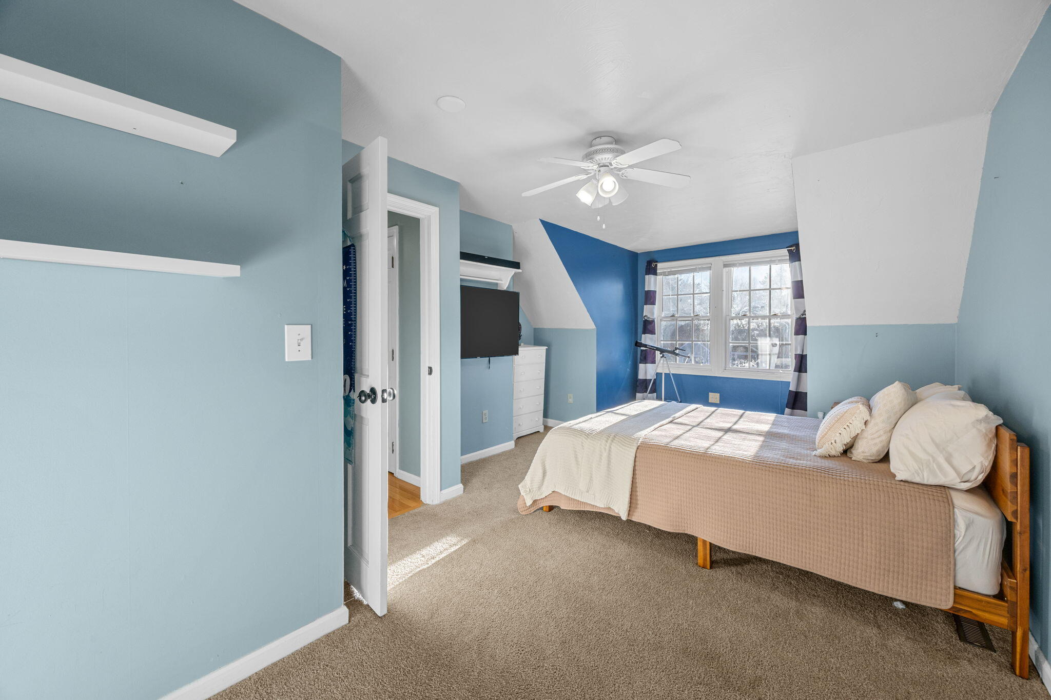 30 Flicker Lane Marstons Mills, MA 02648 - Photo 29 of 47 a bedroom with a bed ceiling fan and window