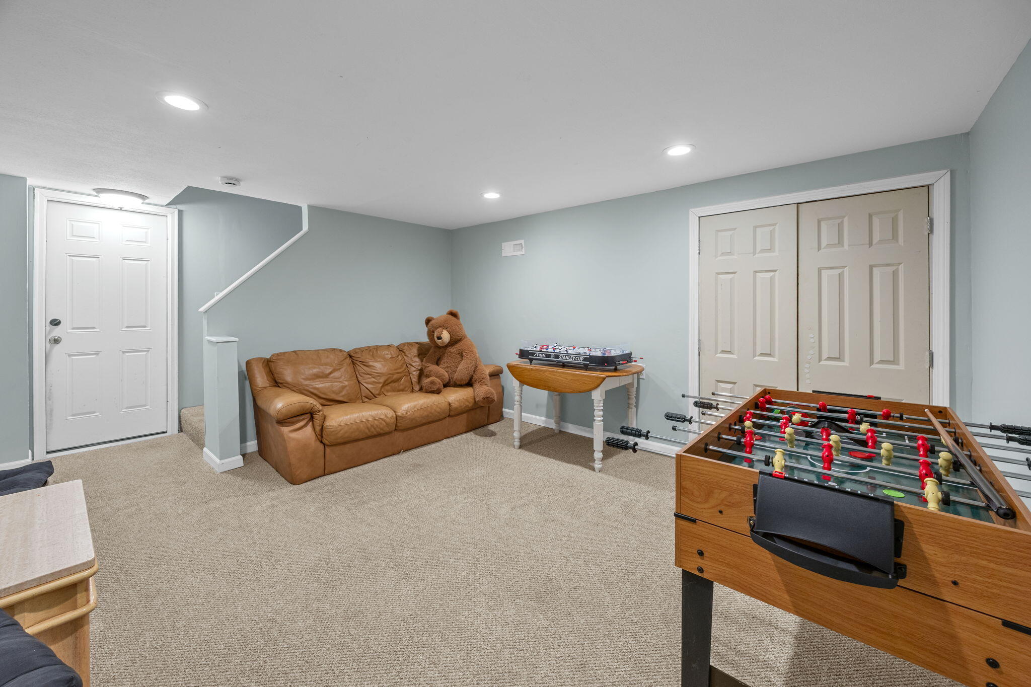 30 Flicker Lane Marstons Mills, MA 02648 - Photo 35 of 47 a living room with furniture a flat screen tv and a lamp