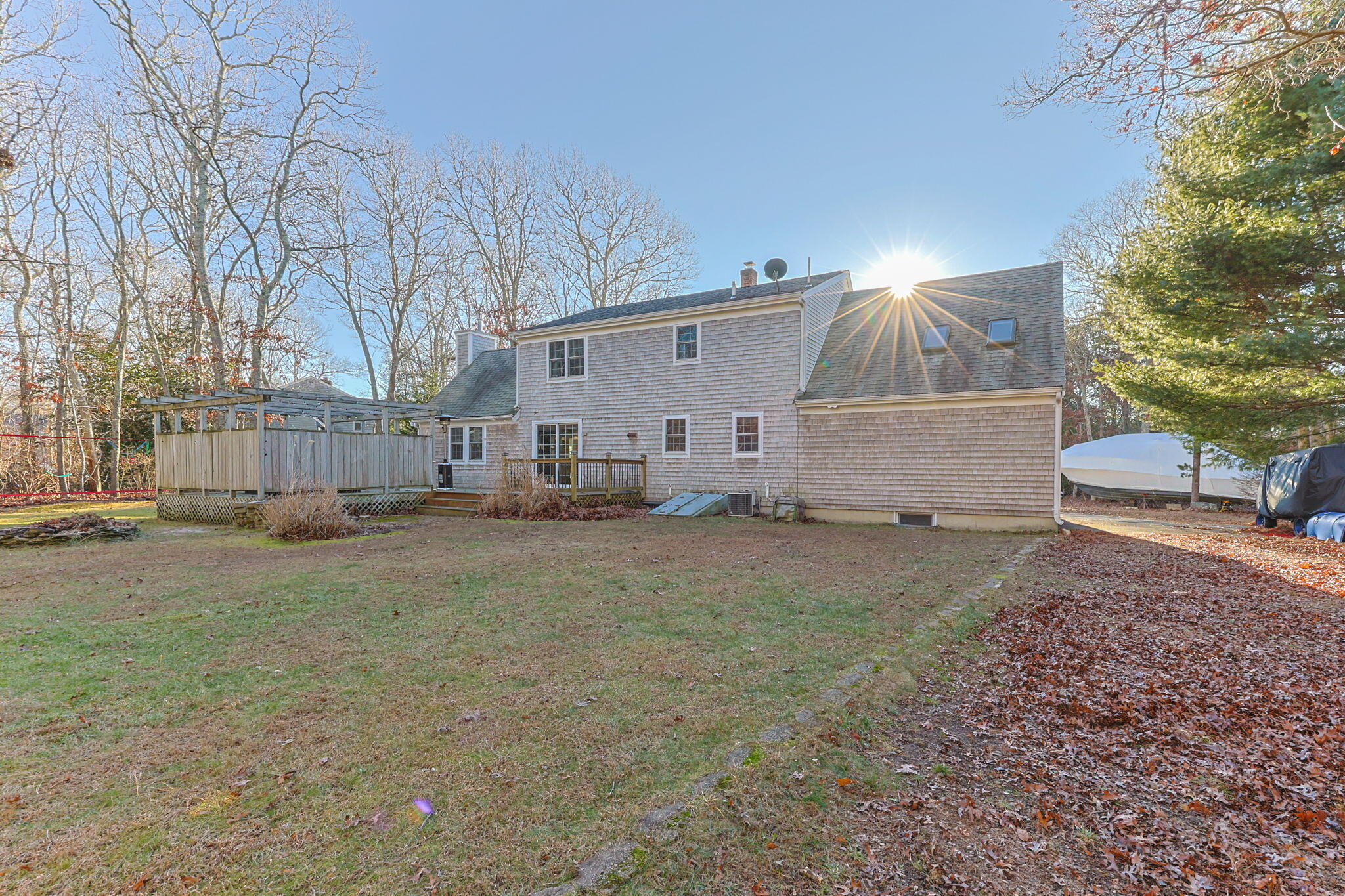 30 Flicker Lane Marstons Mills, MA 02648 - Photo 37 of 47 a house view with a backyard space
