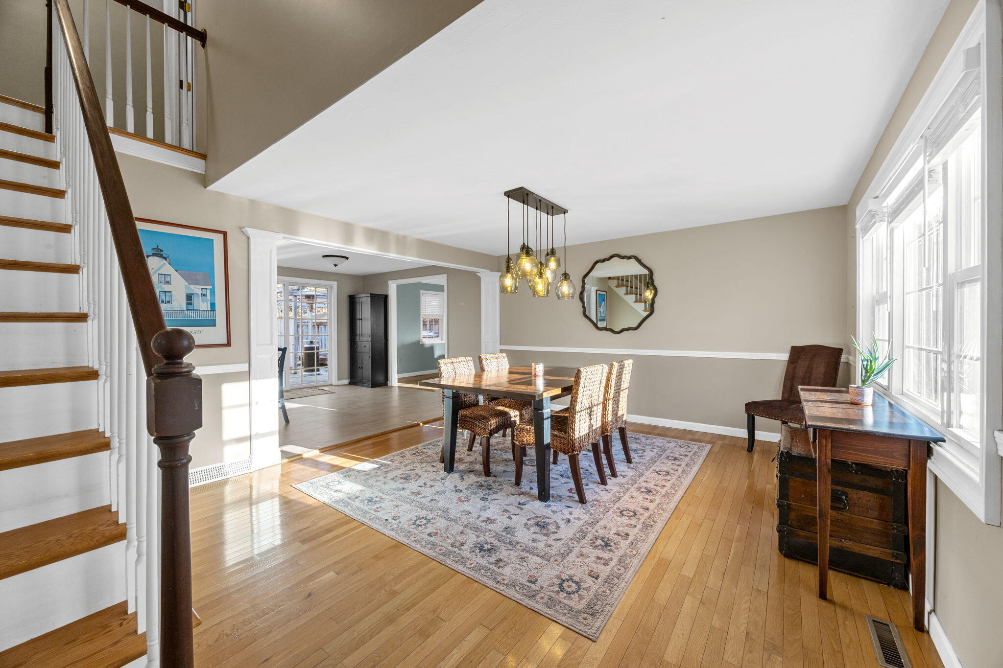 30 Flicker Lane Marstons Mills, MA 02648 - Photo 9 of 47 a view of a dining room with furniture window and wooden floor