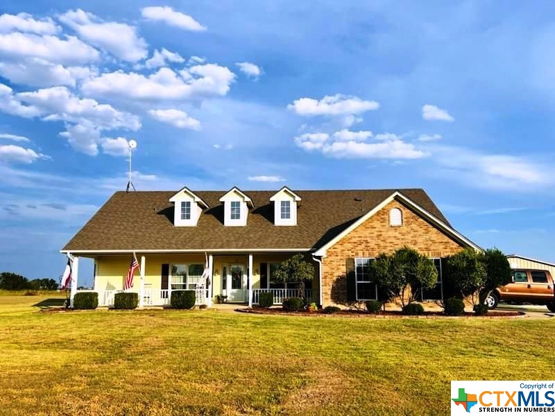 a view of a house with a swimming pool