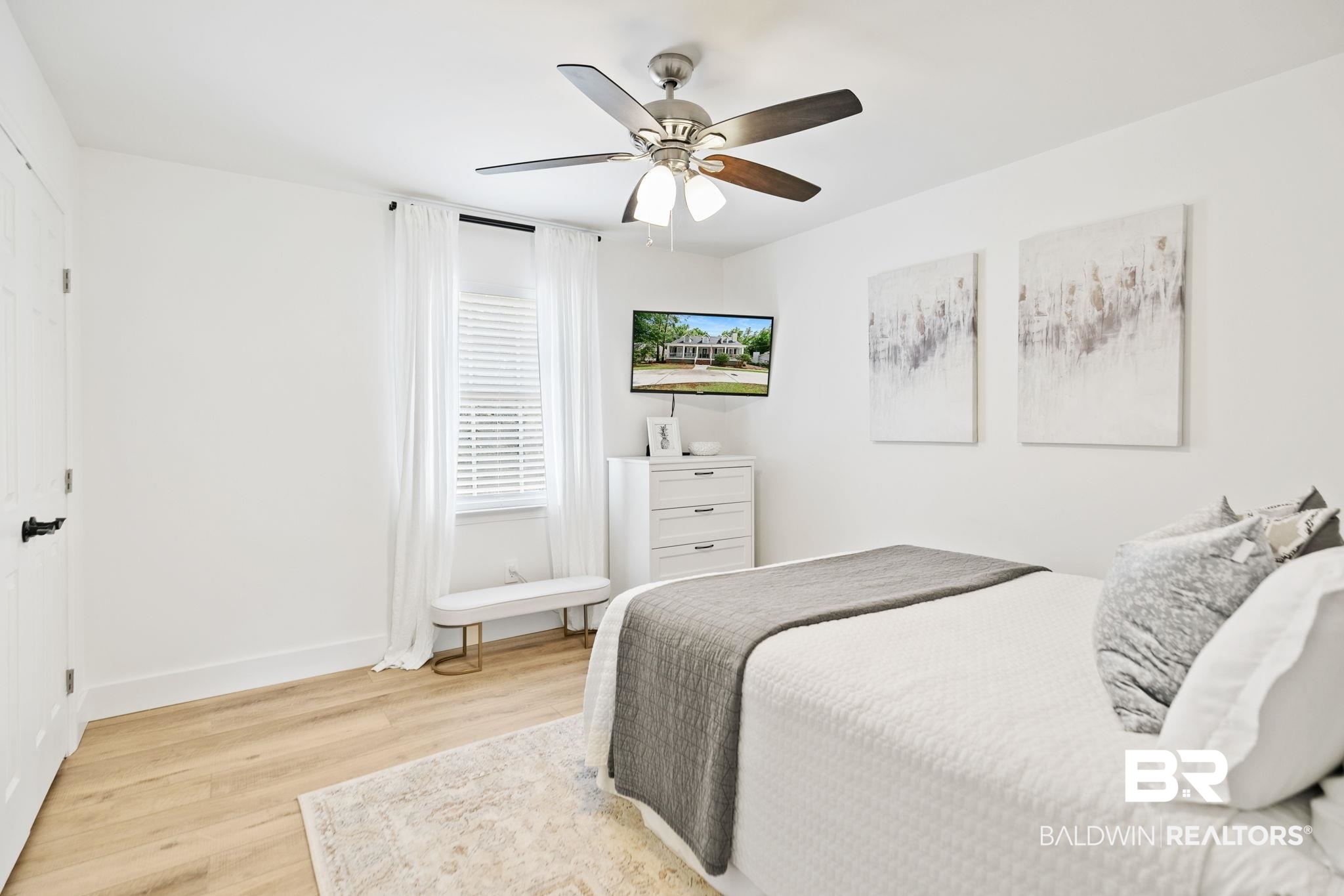342 Ridgewood Drive Daphne, AL 36526 - Photo 15 of 36 Bedroom with ceiling fan and light wood-type flooring