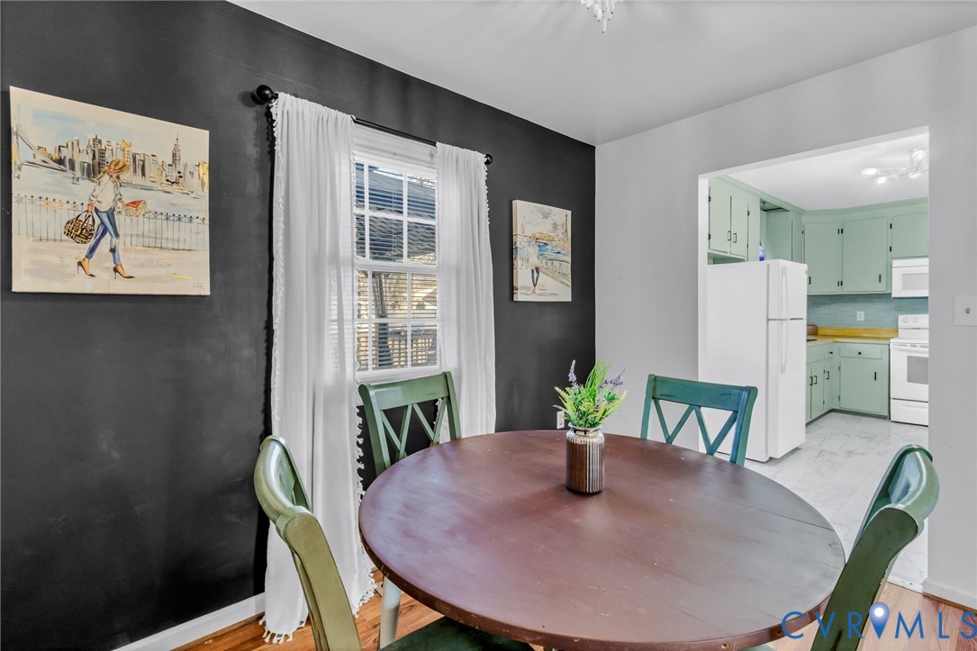 151 Badger Road Deltaville, VA 23043 - Photo 14 of 39 Dining space featuring baseboards and light wood-s