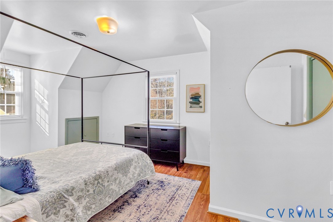 151 Badger Road Deltaville, VA 23043 - Photo 20 of 39 Bedroom with light wood finished floors and lofted