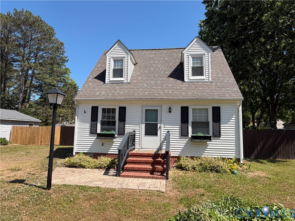 151 Badger Road Deltaville, VA 23043 - Photo 2 of 43 a front view of a house with stairs