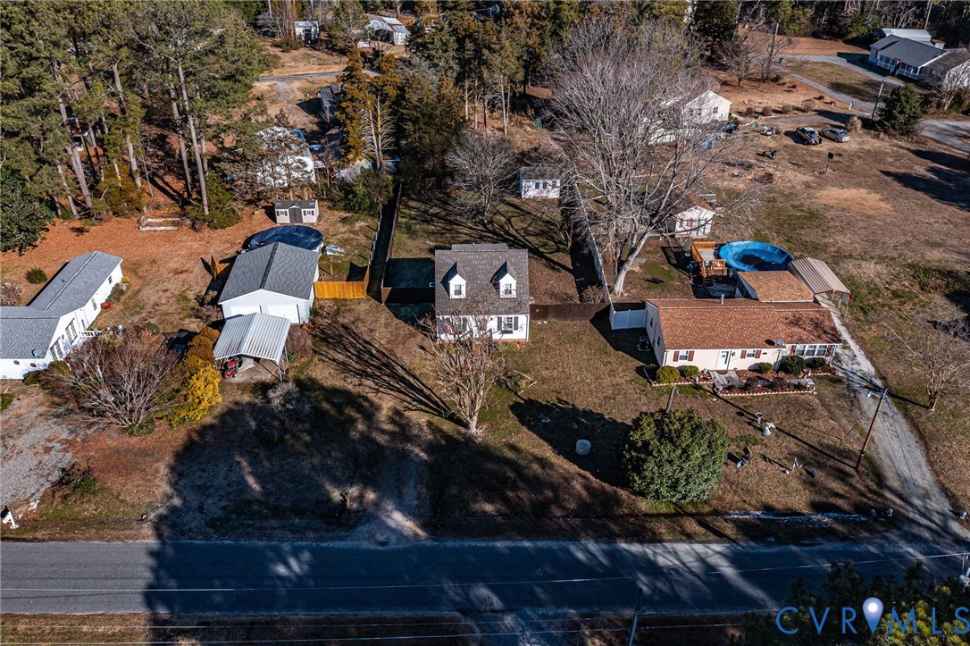 151 Badger Road Deltaville, VA 23043 - Photo 28 of 43 an aerial view of a house with a yard