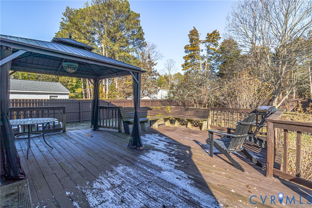 151 Badger Road Deltaville, VA 23043 - Photo 33 of 39 Deck featuring outdoor dining area, a gazebo, and