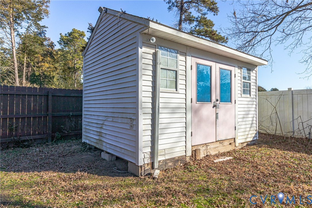 151 Badger Road Deltaville, VA 23043 - Photo 38 of 43 a view of a house with a yard