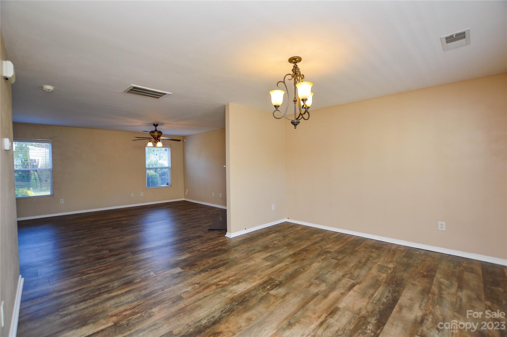 9310 John Russell Road Charlotte, NC 28215 - Photo 12 of 40 wooden floor in an empty room with a window