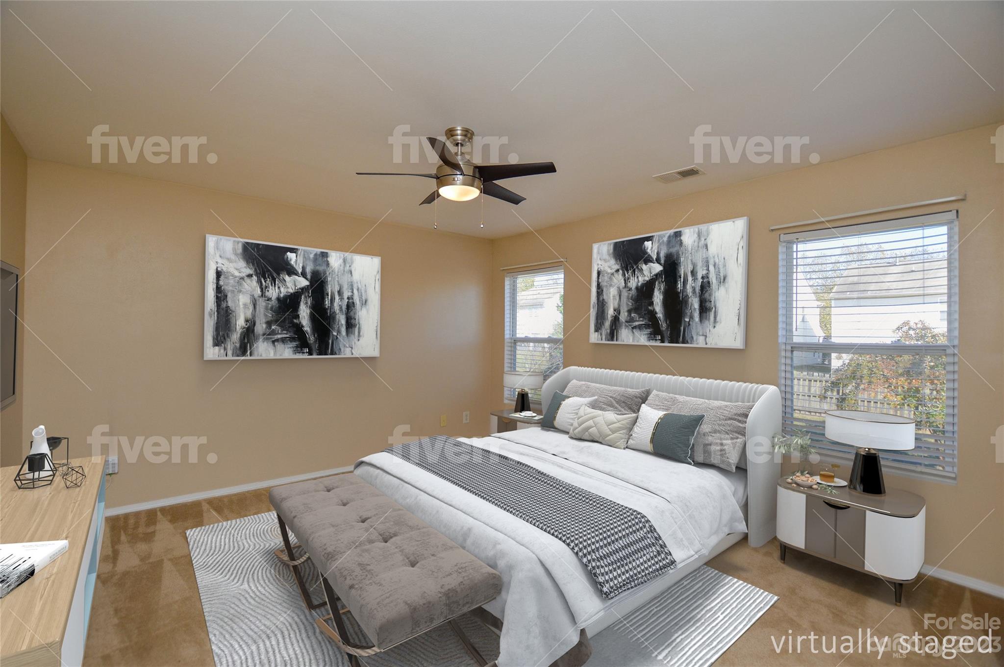 9310 John Russell Road Charlotte, NC 28215 - Photo 21 of 40 a bedroom with a large bed a chandelier and a window