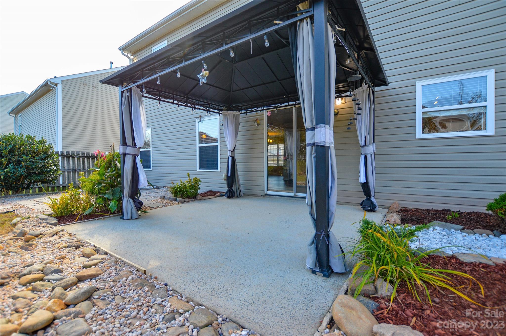 9310 John Russell Road Charlotte, NC 28215 - Photo 38 of 40 a view of a house with a patio