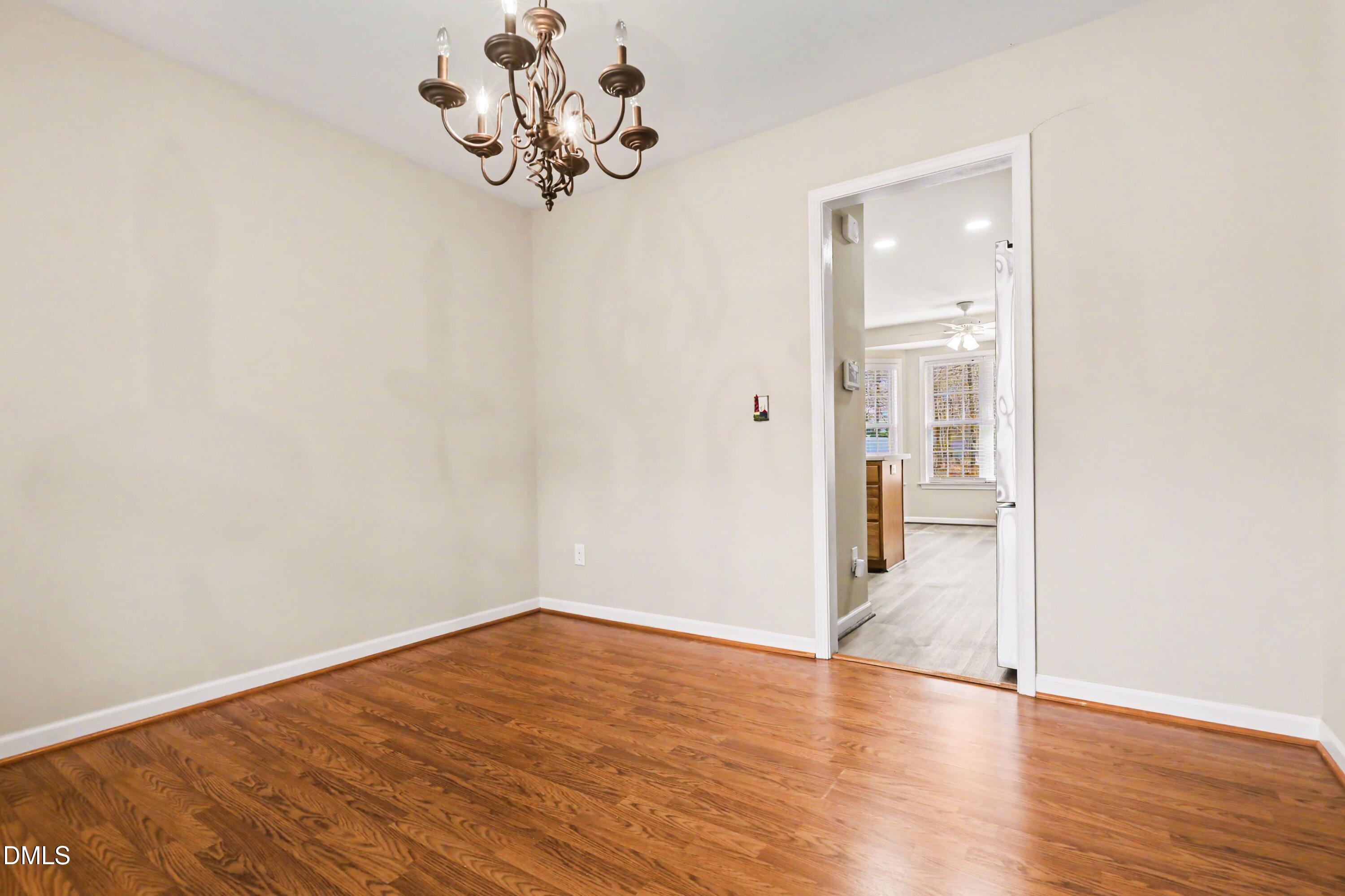 390 Eagle Stone Ridge Youngsville, NC 27596 - Photo 14 of 29 a view of a room with wooden floor