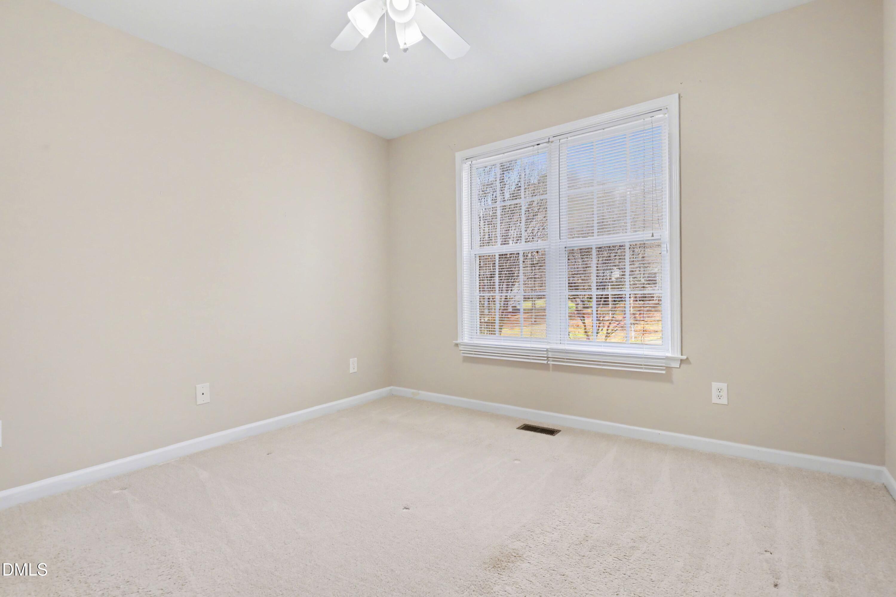 390 Eagle Stone Ridge Youngsville, NC 27596 - Photo 19 of 29 an empty room with a window