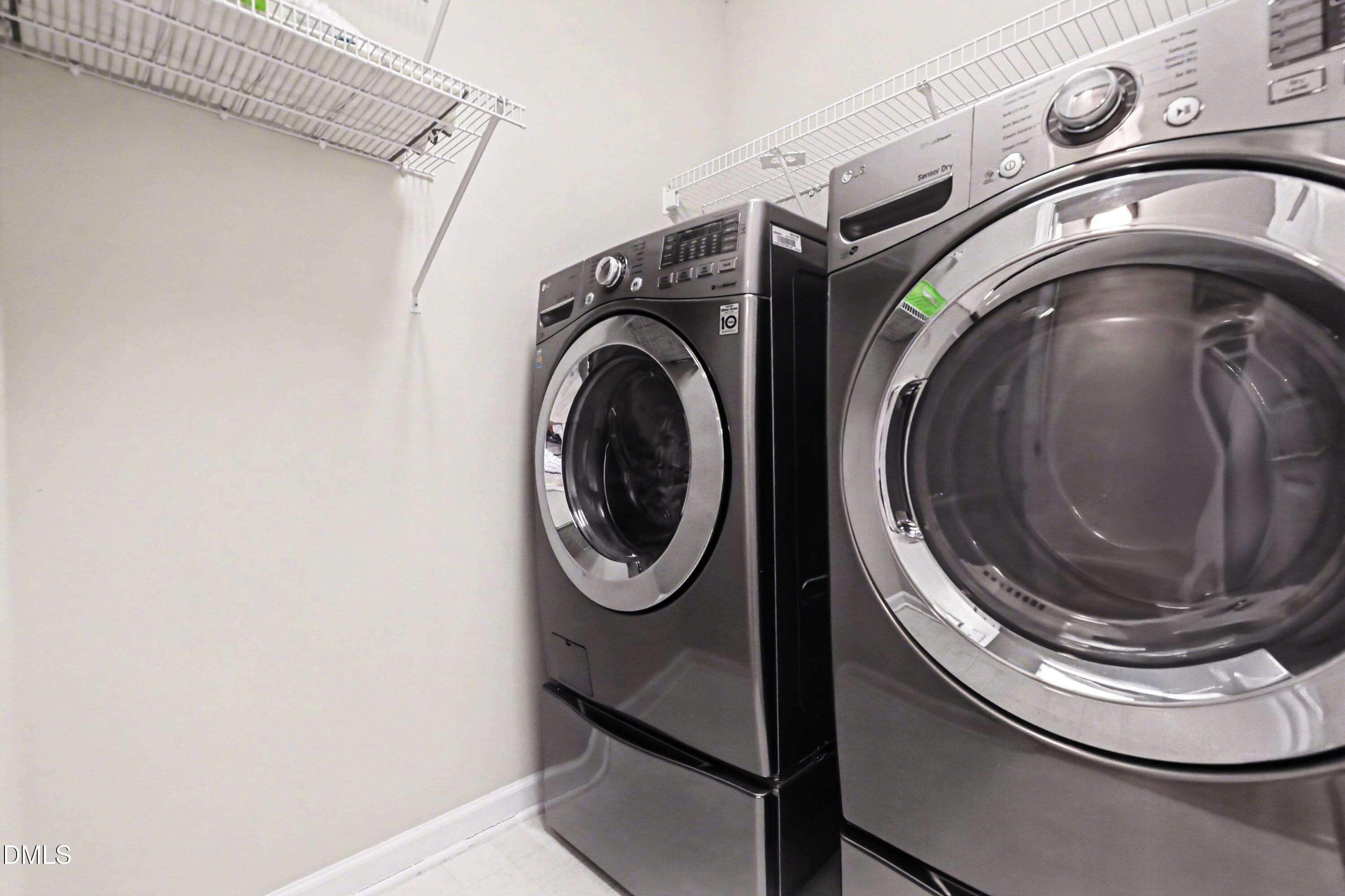 390 Eagle Stone Ridge Youngsville, NC 27596 - Photo 24 of 29 a close up view of washer and dryer