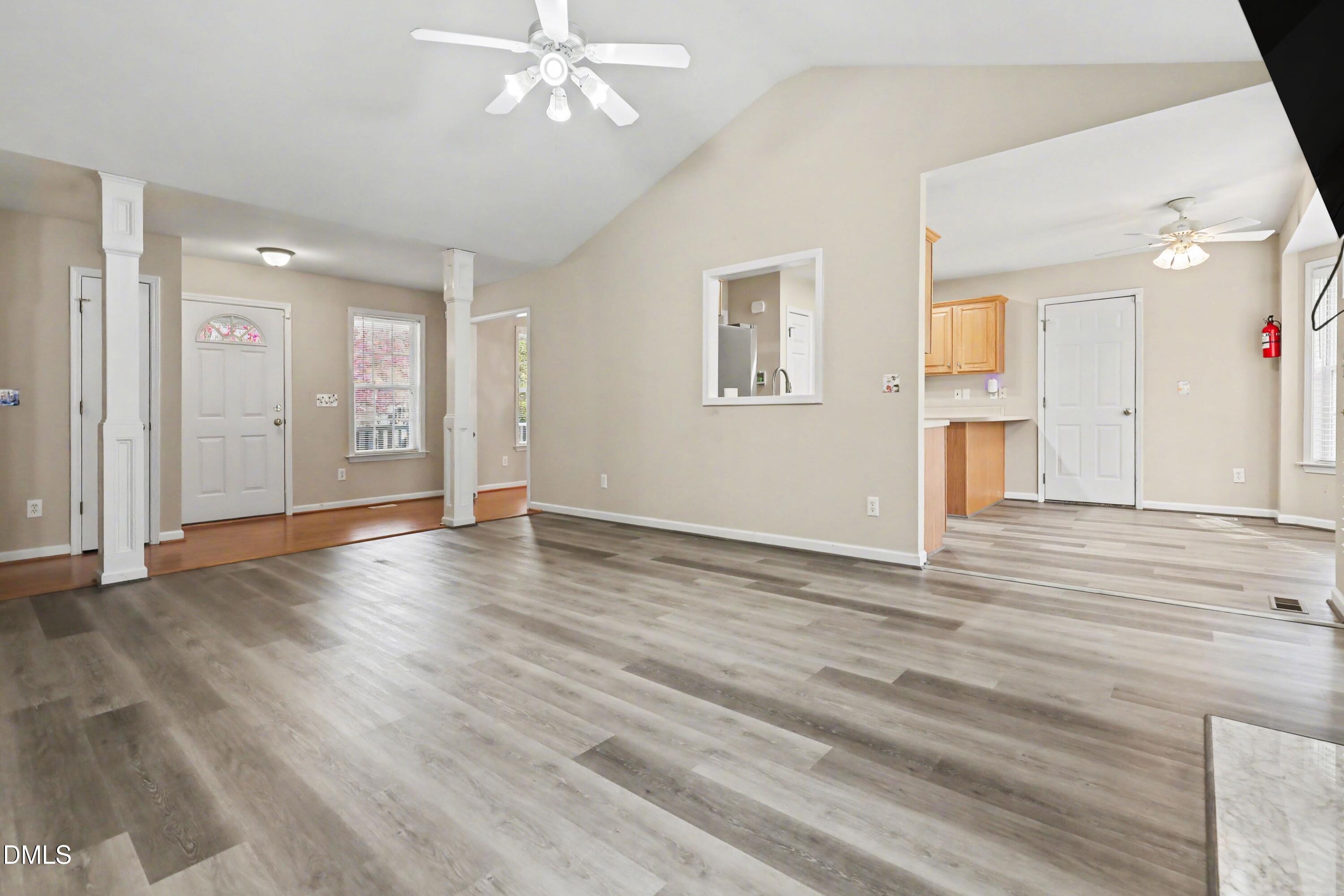 390 Eagle Stone Ridge Youngsville, NC 27596 - Photo 7 of 29 a view of livingroom with hardwood floor and ceiling fan