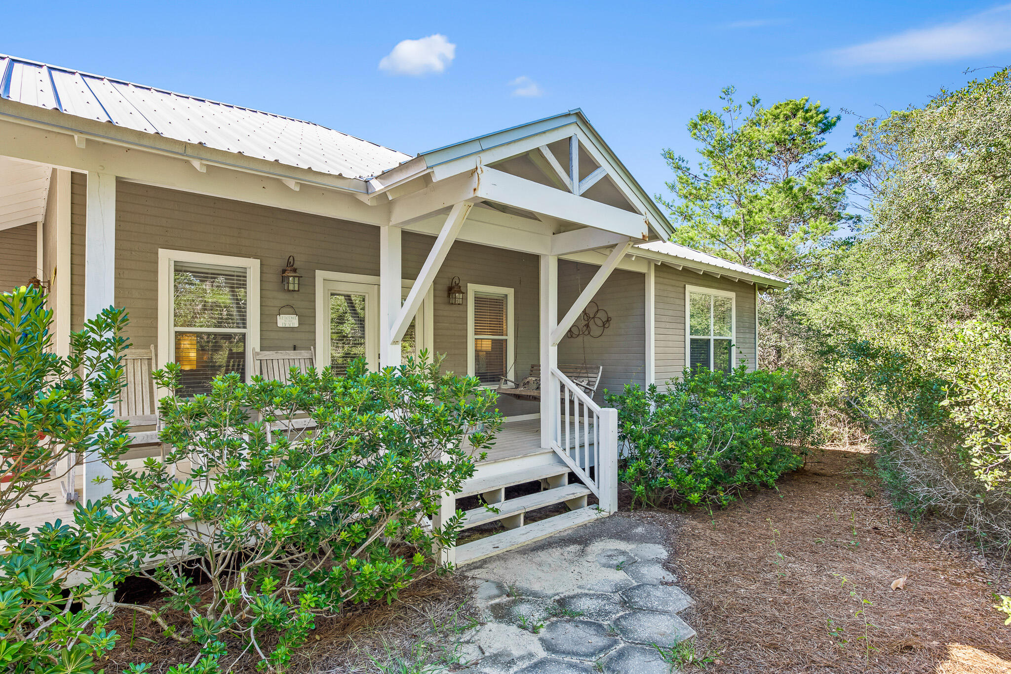front view of a house with a yard