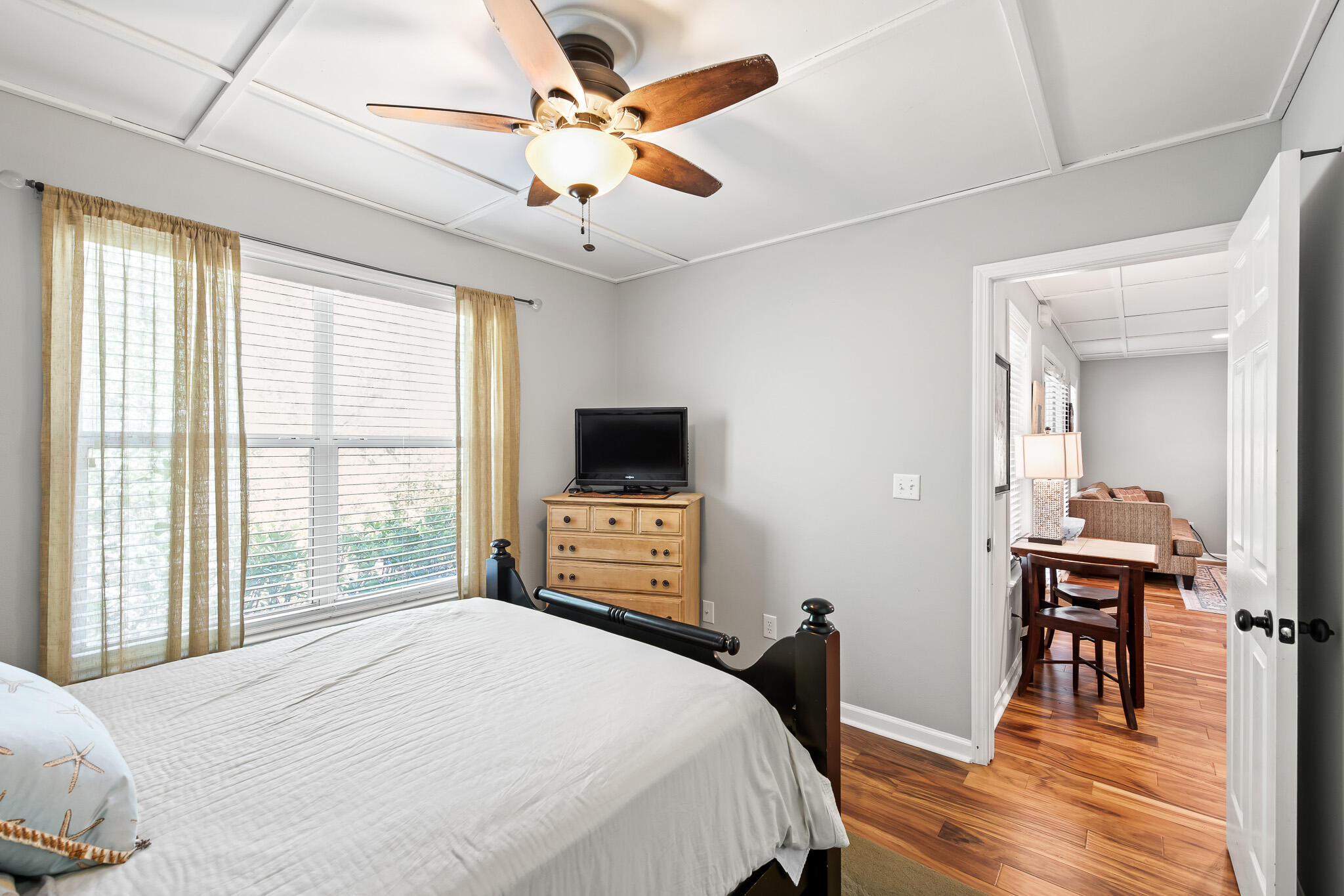 54 Sand Dunes Road Santa Rosa Beach, FL 32459 - Photo 11 of 22 a bedroom with a bed and a flat screen tv