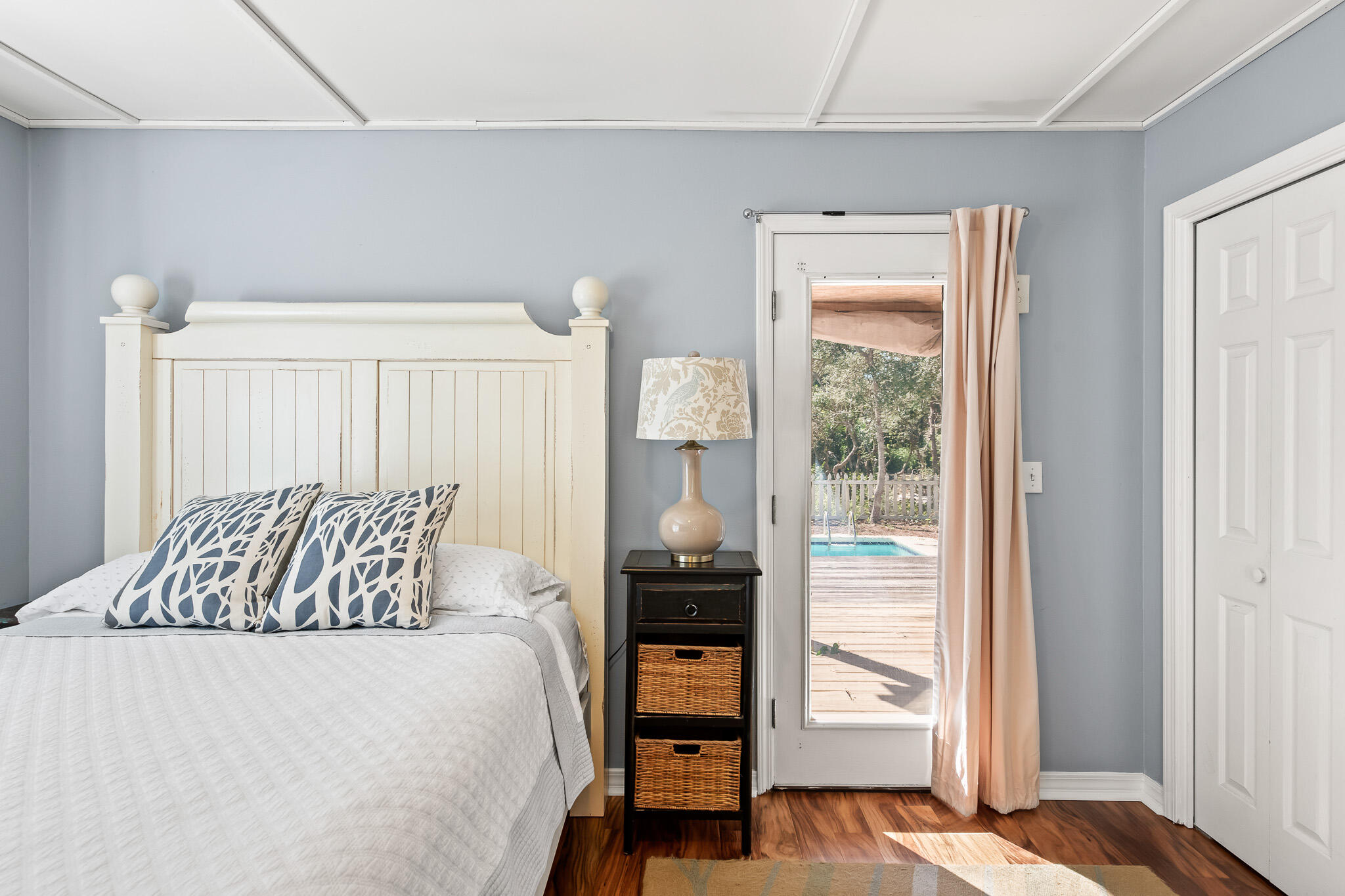 54 Sand Dunes Road Santa Rosa Beach, FL 32459 - Photo 13 of 22 a bedroom with a bed and wooden floor