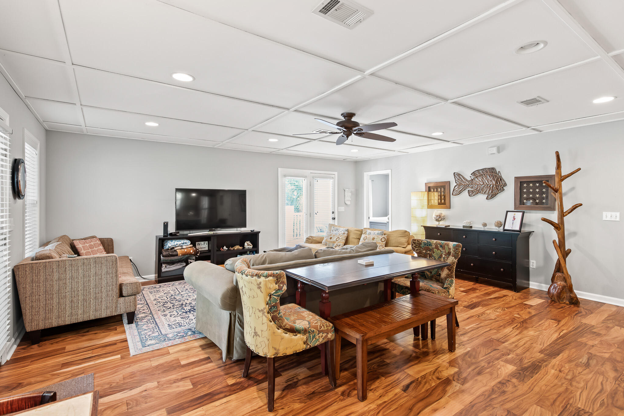 54 Sand Dunes Road Santa Rosa Beach, FL 32459 - Photo 8 of 22 a view of a livingroom with furniture and a flat screen tv