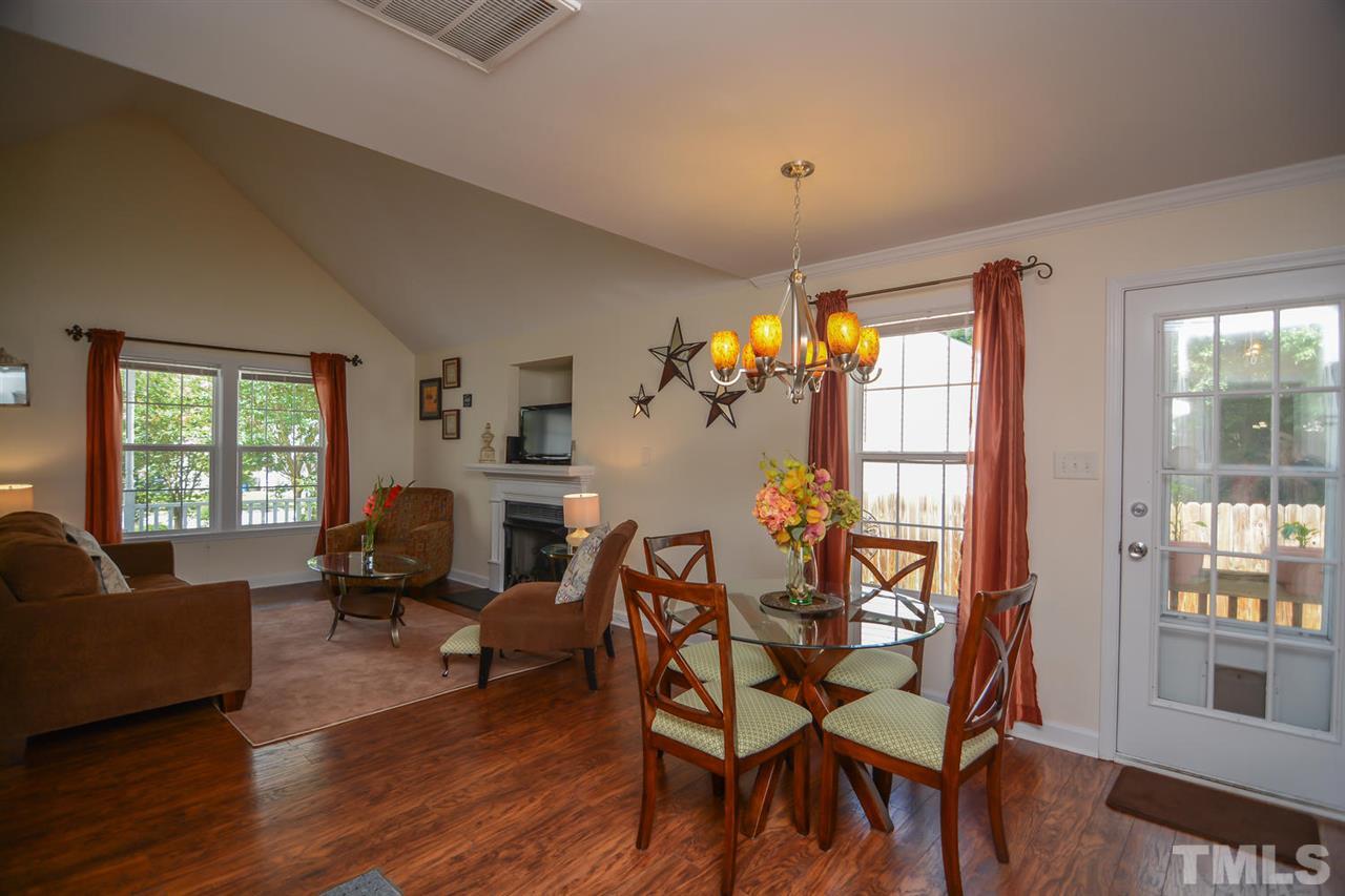 4412 Archibald Way Raleigh, NC 27616 - Photo 11 of 25 a living room with furniture and a large window