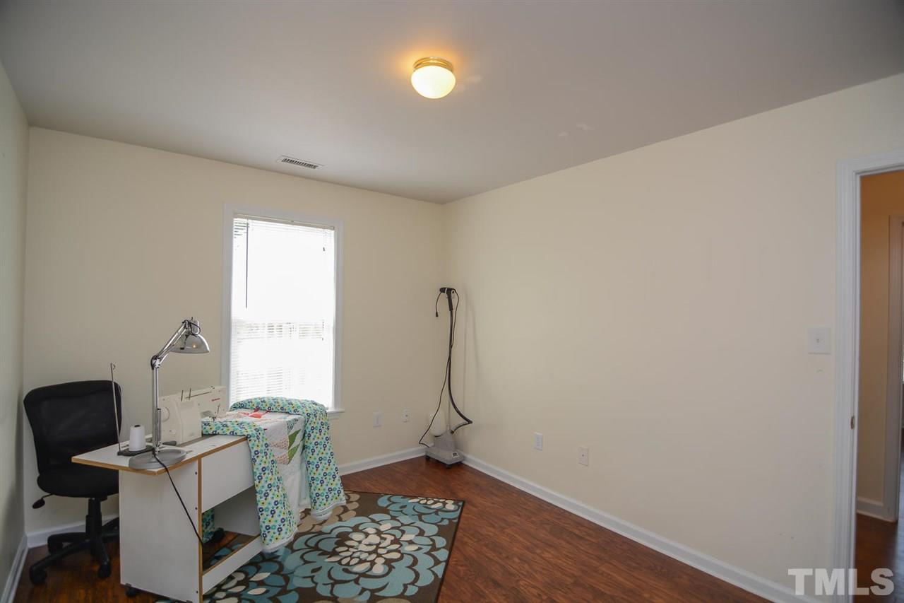 4412 Archibald Way Raleigh, NC 27616 - Photo 15 of 25 a room with furniture and a window