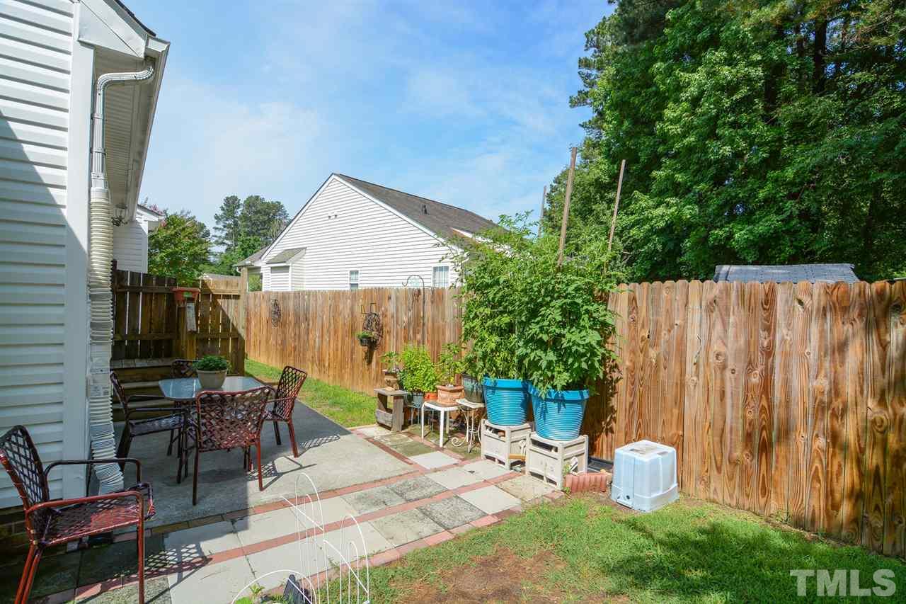 4412 Archibald Way Raleigh, NC 27616 - Photo 22 of 25 an outdoor space with patio furniture