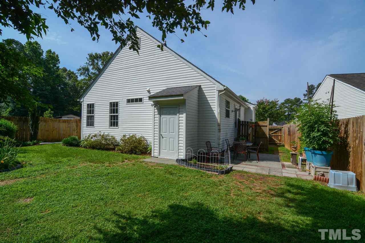 4412 Archibald Way Raleigh, NC 27616 - Photo 23 of 25 a view of a house with backyard and garden