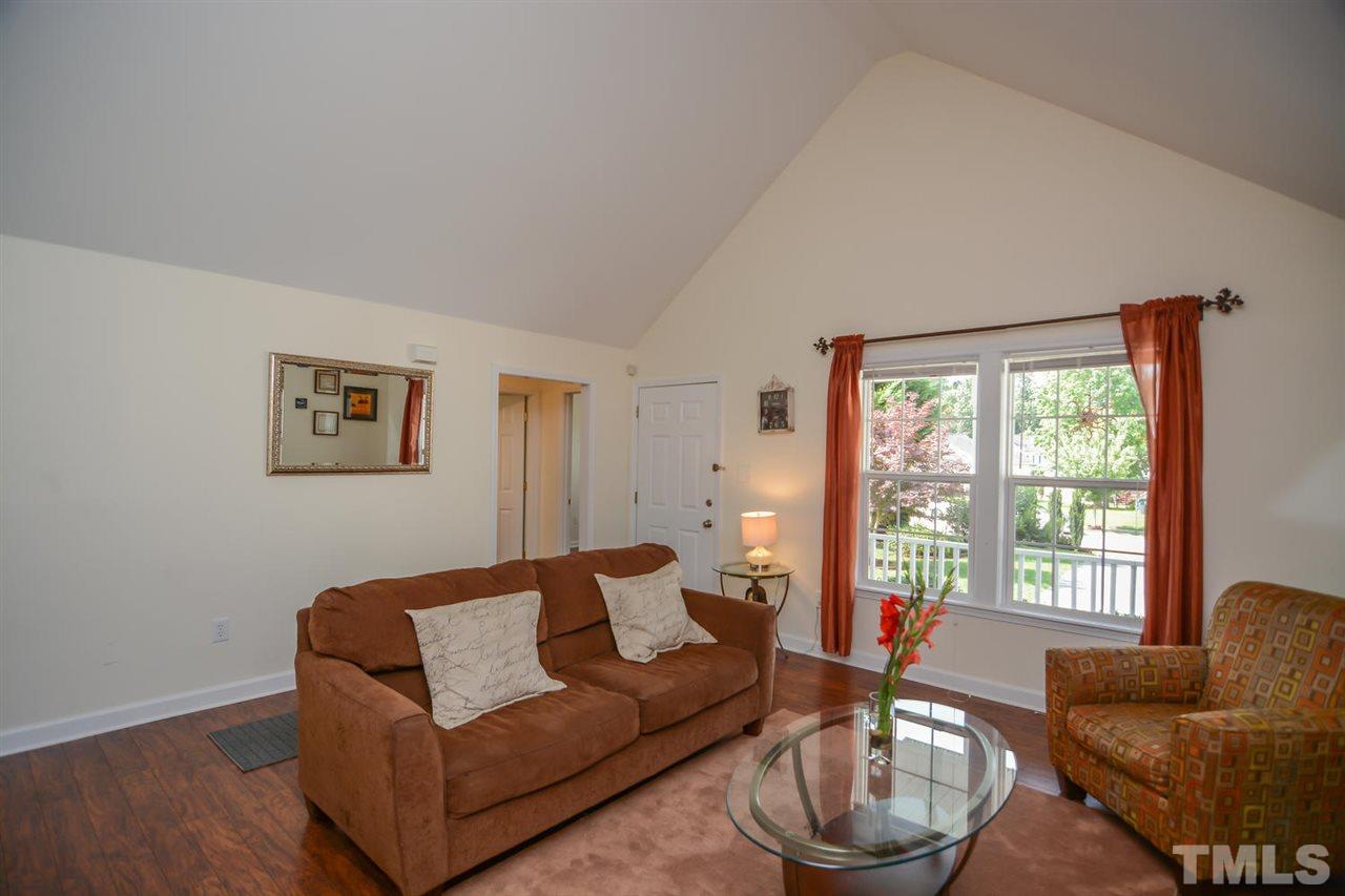 4412 Archibald Way Raleigh, NC 27616 - Photo 6 of 25 a living room with furniture and a large window